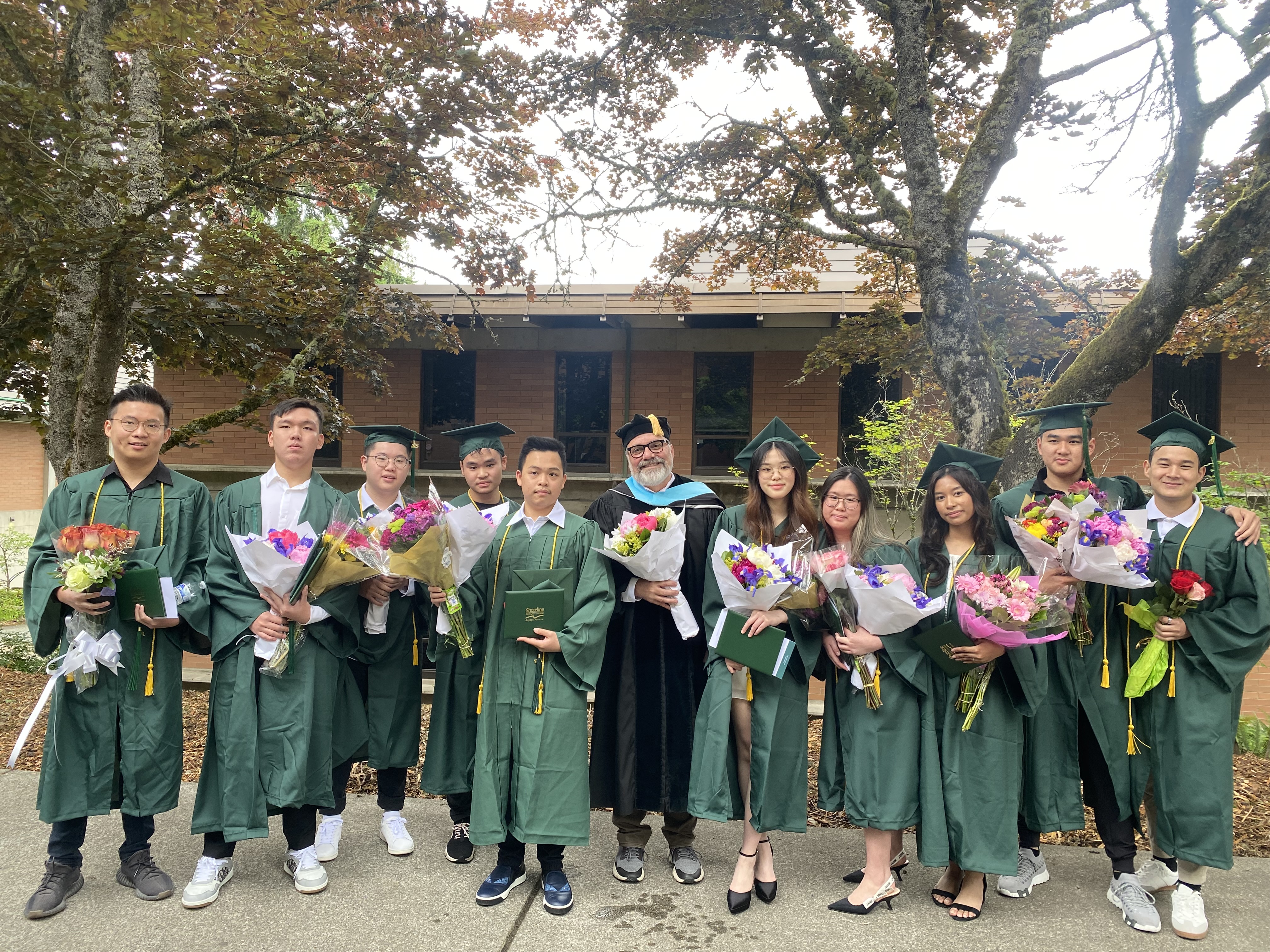 Dr Kahn and graduates