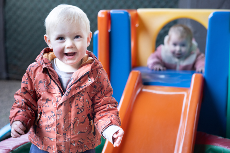 Toddler near slide